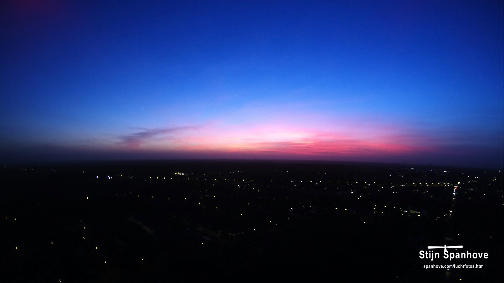 Rode zonsondergang boven Meetjesland